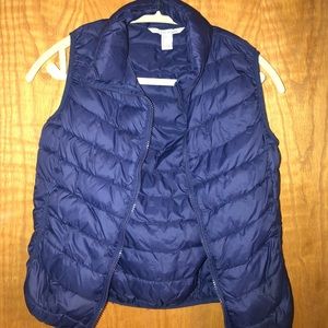 A puffy navy vest